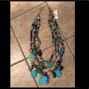 Chico’s triple strand long necklace